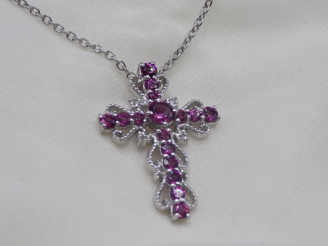 Vintage sterling silver amethyst gemstone cross with necklace: Vintage sterling silver amethyst gemstone cross with necklace. Marked as shown. Beautiful colors. In very good original as found condition. Great quality and detail. Cross is 1 1/4 inches tall. 