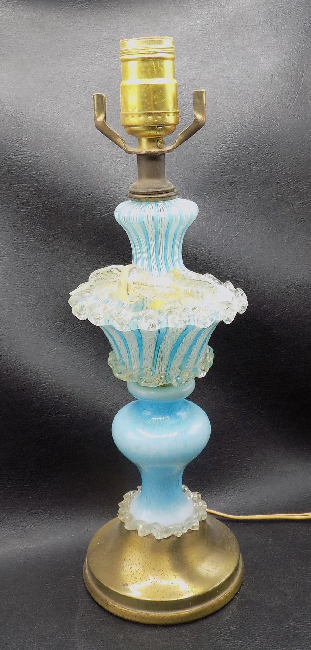 Midcentury Italian Murano latticino ribbon art glass lamp: Midcentury Italian Murano latticino ribbon art glass lamp. One of pair. Beautiful colors. In very good original as found condition. Great quality and detail. 14 7/8 inches tall to top of socket