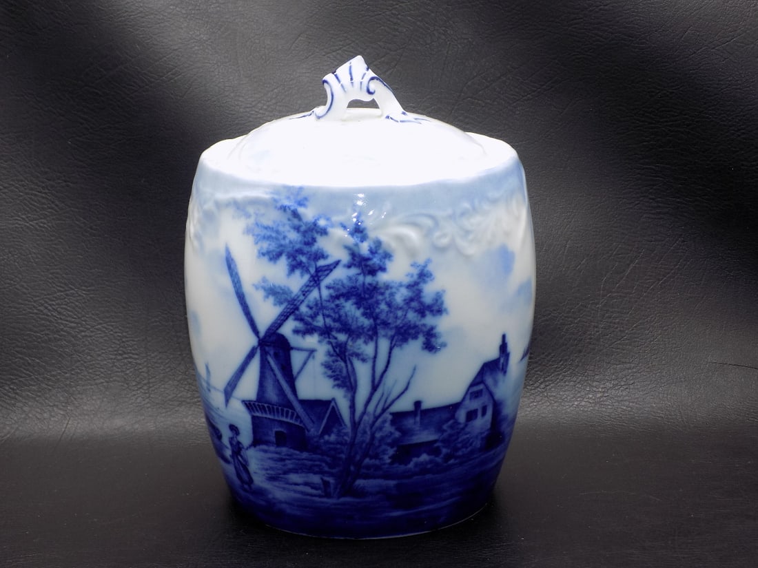 Fine Rosenthal Delft flo blue decorated biscuit or cookie jar with Dutch windmill scene: Fine Rosenthal Delft flo blue decorated biscuit or cookie jar with Dutch windmill scene. Marked on bottom as shown in photos. Beautiful colors. In very good original as found condition. Great