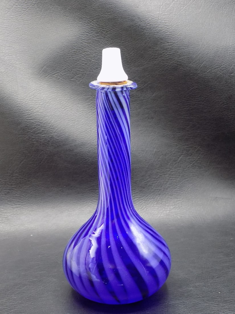 Antique Hobbs Brockunier blue with opalescent swirl barber bottle: Antique Hobbs Brockunier blue with opalescent swirl barber bottle. Original stopper. Beautiful colors. In very good original as found condition. Great quality and detail. 8 ½ inches tall.