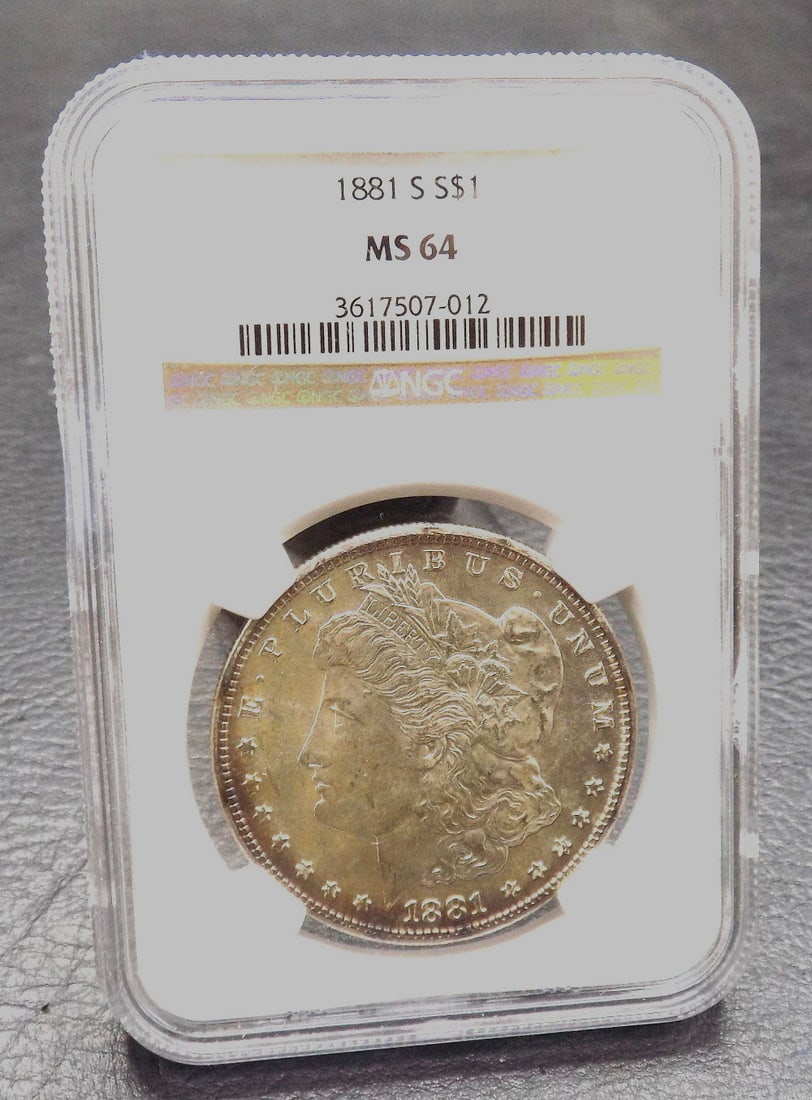 1881 S Uncirculated graded NGC MS64 Morgan silver dollar.: 1881 S Uncirculated graded NGC MS64 Morgan silver dollar. For in house shipping. Please call Mike at Thriftiques 319-321-0613