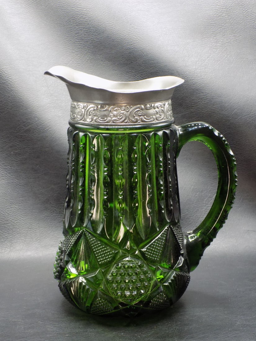 Early American green pattern glass pitcher. (1 of 9)