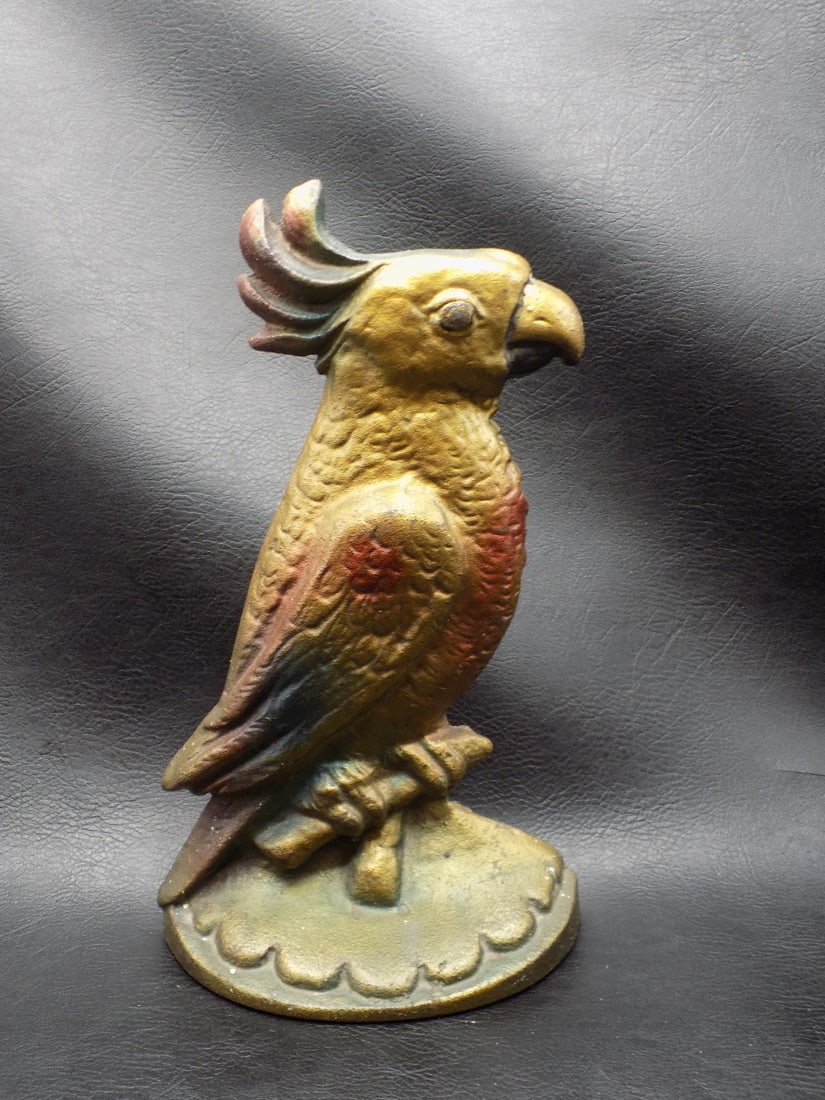 Antique Hubley cast iron cockatoo door stop: Antique Hubley cast iron cockatoo door stop. No maker mark. Beautiful colors. In very good original as found condition. Great quality and detail. 8 ½ tall x 5 wide at base. For in house shippin