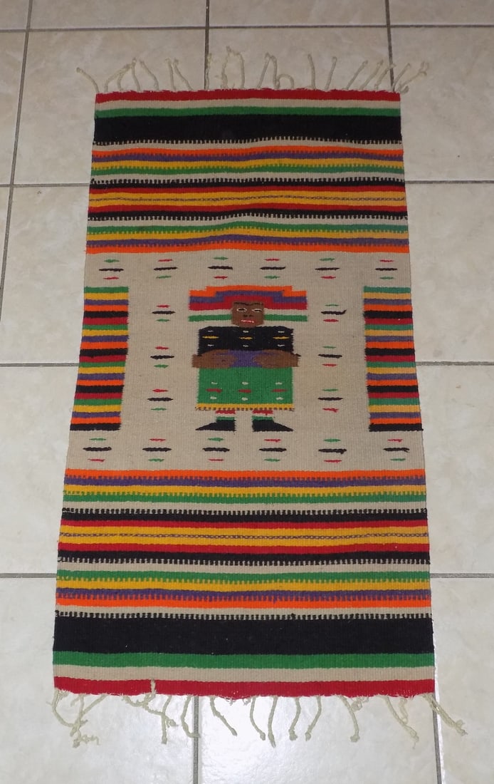 Vintage hand woven rug with figure: Vintage hand woven rug with figure. Beautiful colors. In very good original as found condition. Great quality and detail. 13 ¼ x 19 ½. For in house shipping, please call Mike at Thriftiq