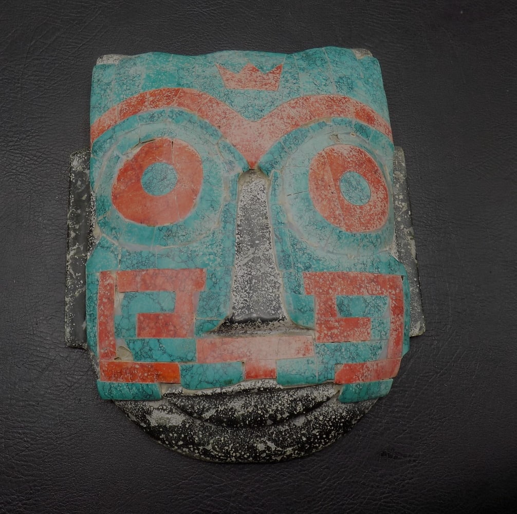 Hand carved stone inlaid mask: Hand carved stone inlaid mask. Appears to be turquoise and coral. Beautiful colors. In very good original as found condition as shown with minor roughness as shown in photos. 8 3/8 inches tall x 6 7/8