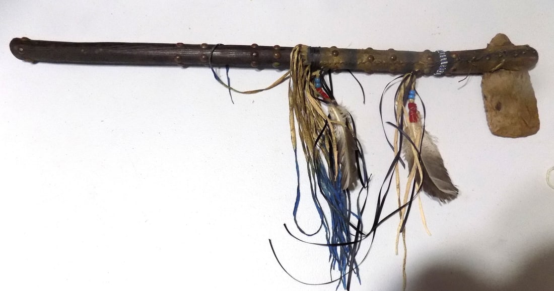 Fabulous Native American Indian tomahawk: Fabulous Native American Indian tomahawk . Leather wrapped with feathers and beads. In very good original as found condition. Great quality and detail. 28 ¼ inches long. Ax head is 6 x 3 inches