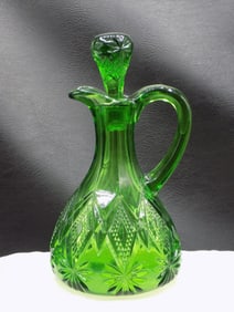 Early American green pattern glass cruet.  Shoshone pattern