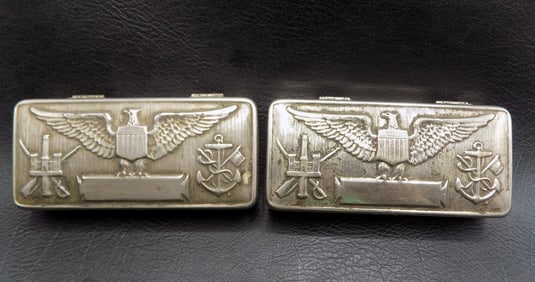 Two World War II shaving kits in patriotic metal boxes