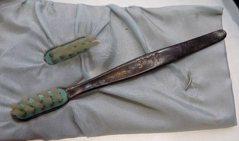 Vintage sterling silver child’s toothbrush