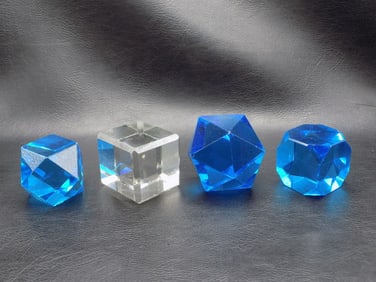 Four cut glass papers.