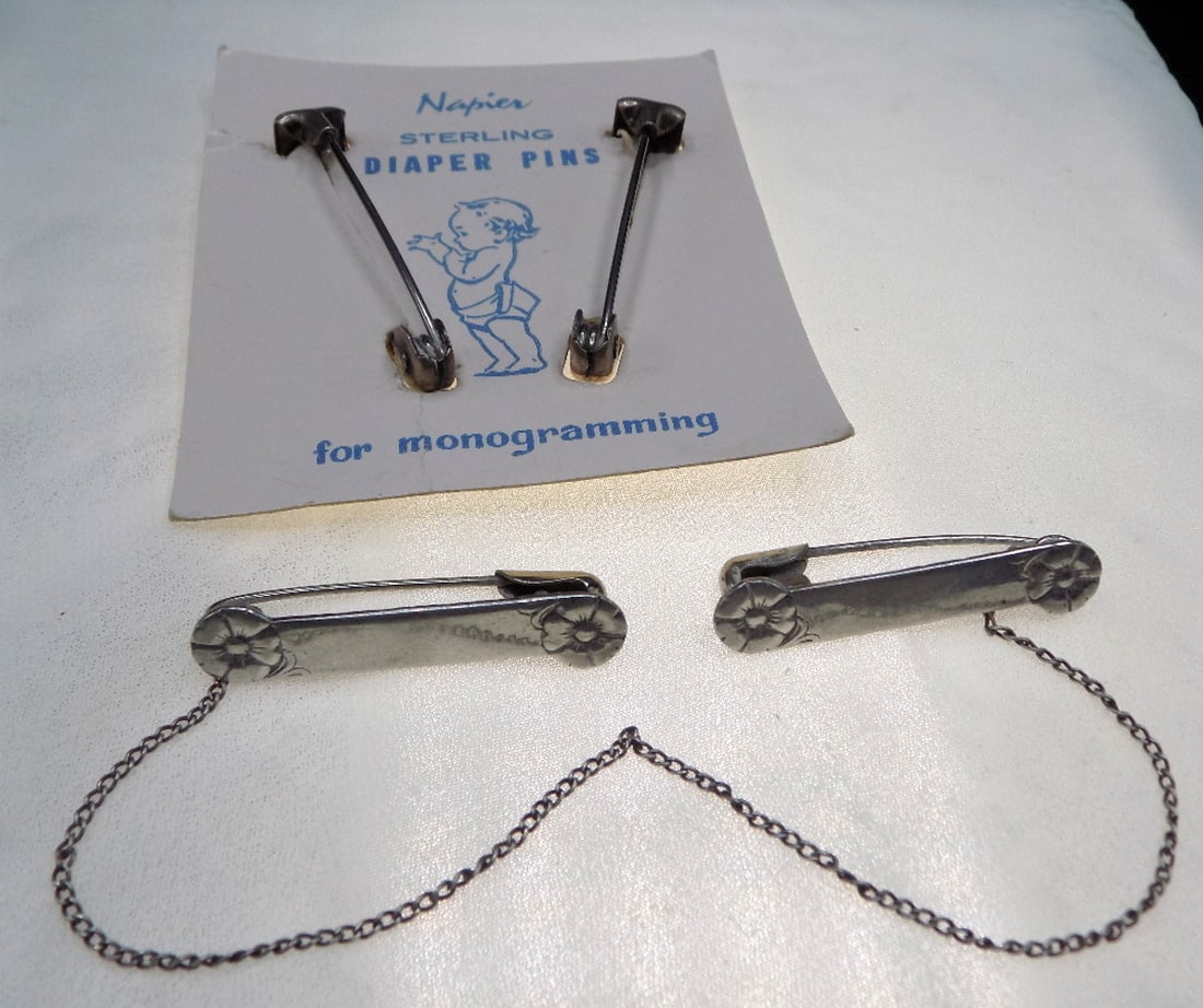 Vintage sterling silver shawl for cardigan attachments and Napier diaper pins: Vintage sterling silver shawl for cardigan attachments and Napier diaper pins. Marked as shown in photo. In very good original as found condition. Great quality and detail. Diaper pins 2 inches long.