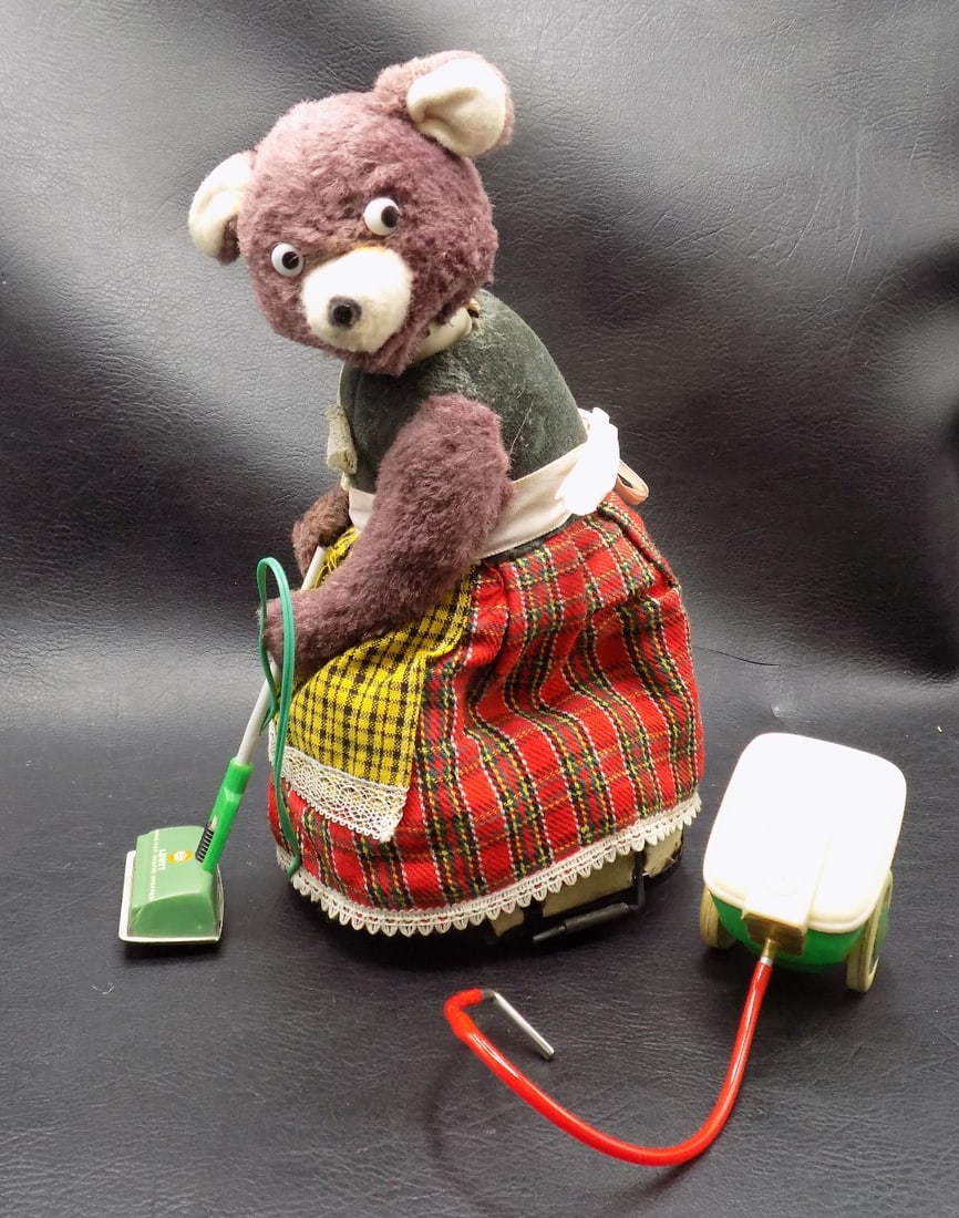 Cragstan alps the busy housekeeper bear battery operated toy.: Cragstan alps the busy housekeeper bear battery operated toy. Working. Beautiful colors. In very good original as found condition with normal wear for age. Great quality and detail. 8 inches tall. For