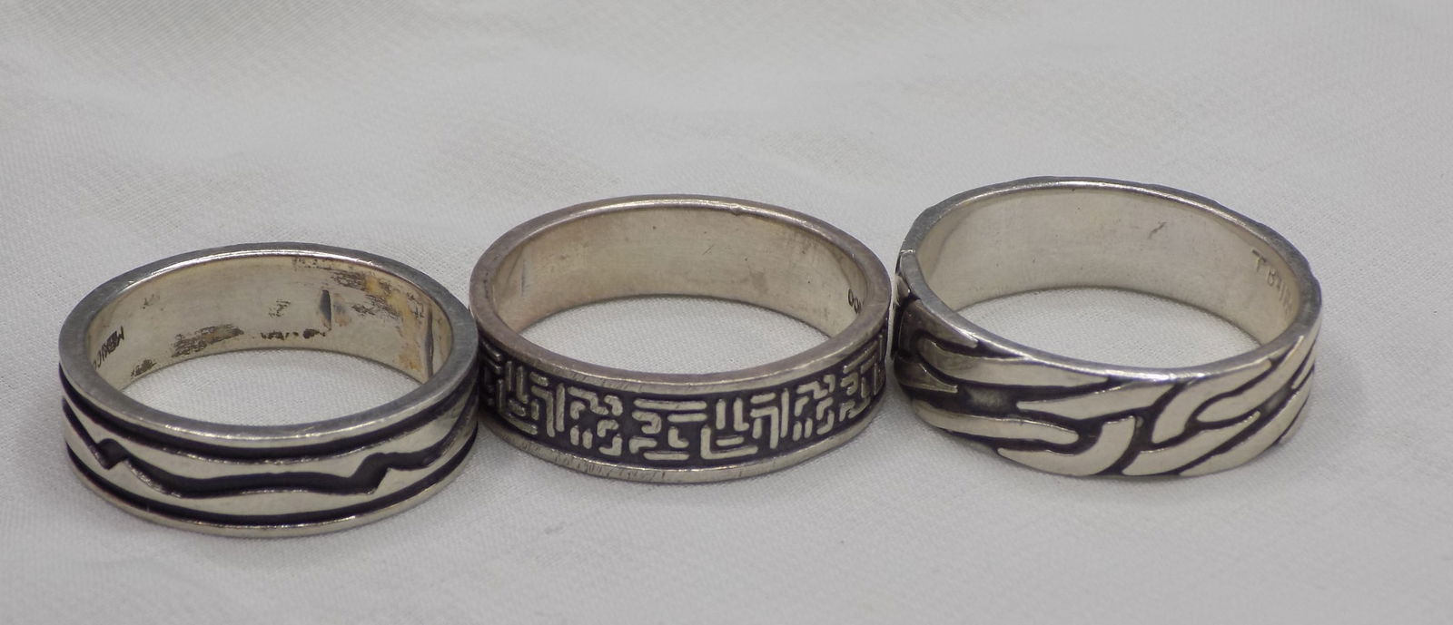 3 decorated sterling rings. (1 of 5)