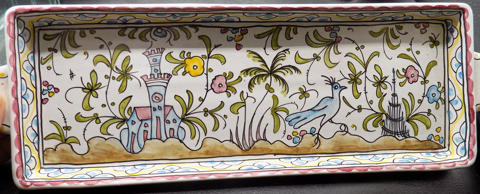 Vintage hand painted serving tray.: Vintage hand painted serving tray. Made in Portugal. In very good original as found condition. Great quality and detail. 19 x 4 x 1 inch tall. Beautiful colors. For in house shipping, please call Mike