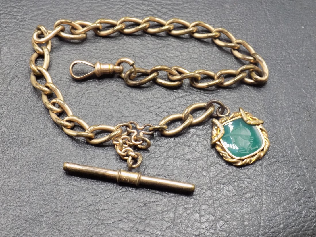 Antique watch fob with etched decorated insert: Antique watch fob with etched decorated insert. Marked 800. In very good original as found condition. Great quality and detail. 11 inches long. ¾ inch square pendant. White lines or dots are ca