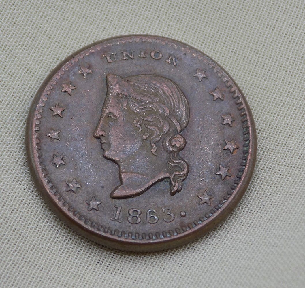 Civil War merchant token. Dealer in watches, jewelry and pianos: Civil War merchant token. Dealer in watches, jewelry and pianos. Racine Wisconsin. 1863 Please use photos for condition. For in house shipping, please call Mike at Thriftiques 319-321-0613