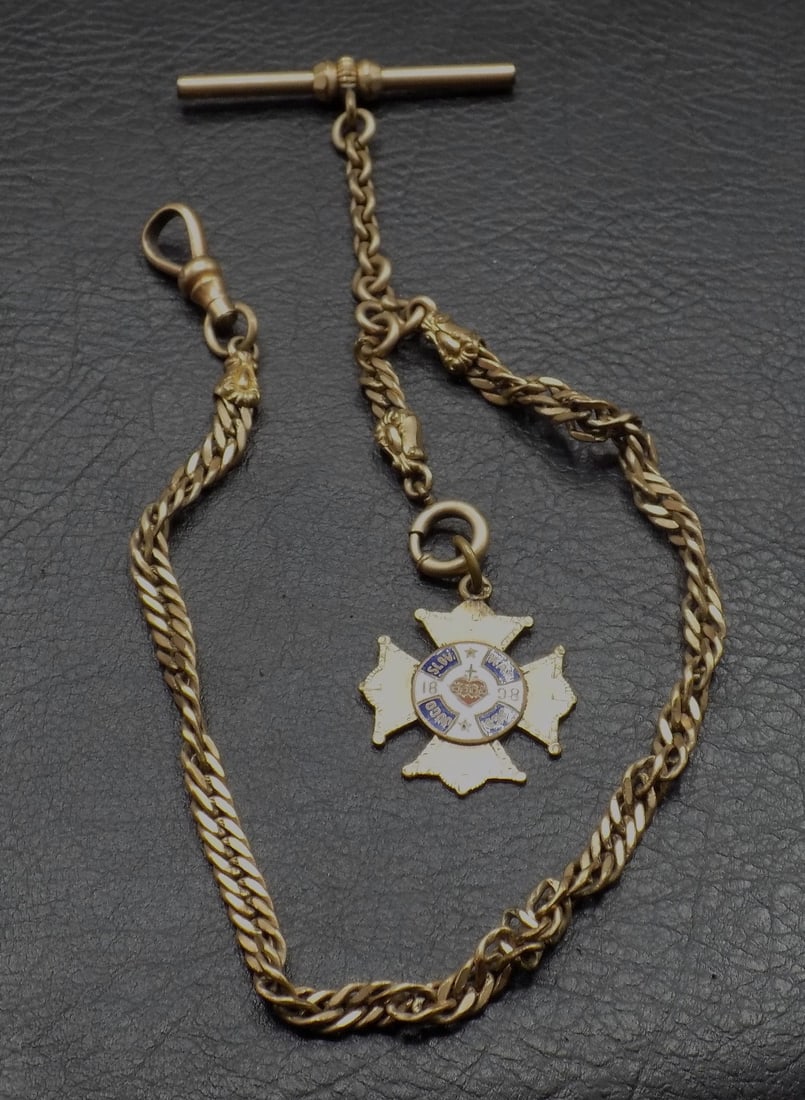 1898 gold fill fraternal watch fob: 1898 gold fill fraternal watch fob. Marked as shown in photos. Beautiful colors. In very good original as found condition. Great quality and detail. 13 1/8 inches long. For in house shipping,