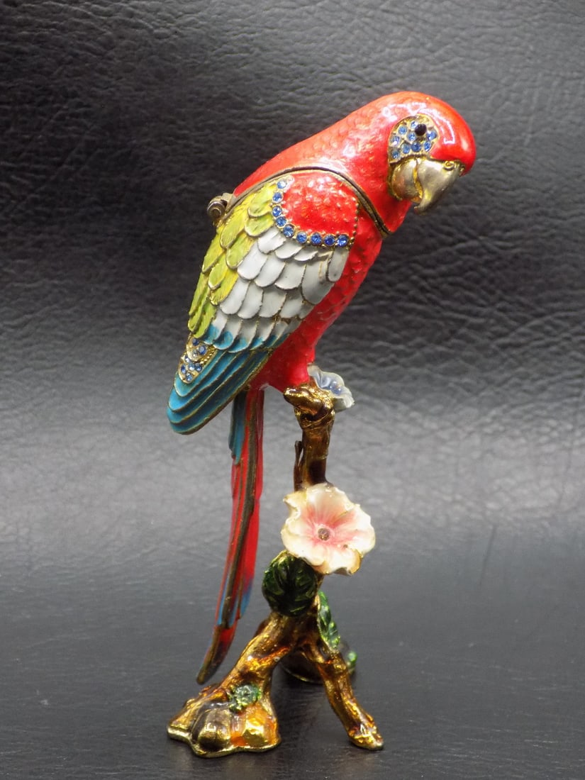 Wonderful vibrant enamel decorated macaw ring holder: Wonderful vibrant enamel decorated macaw ring holder. Blue faceted glass inserts In very good original as found condition. Great quality and detail. Made withing last twenty years. 4 3/8 inches