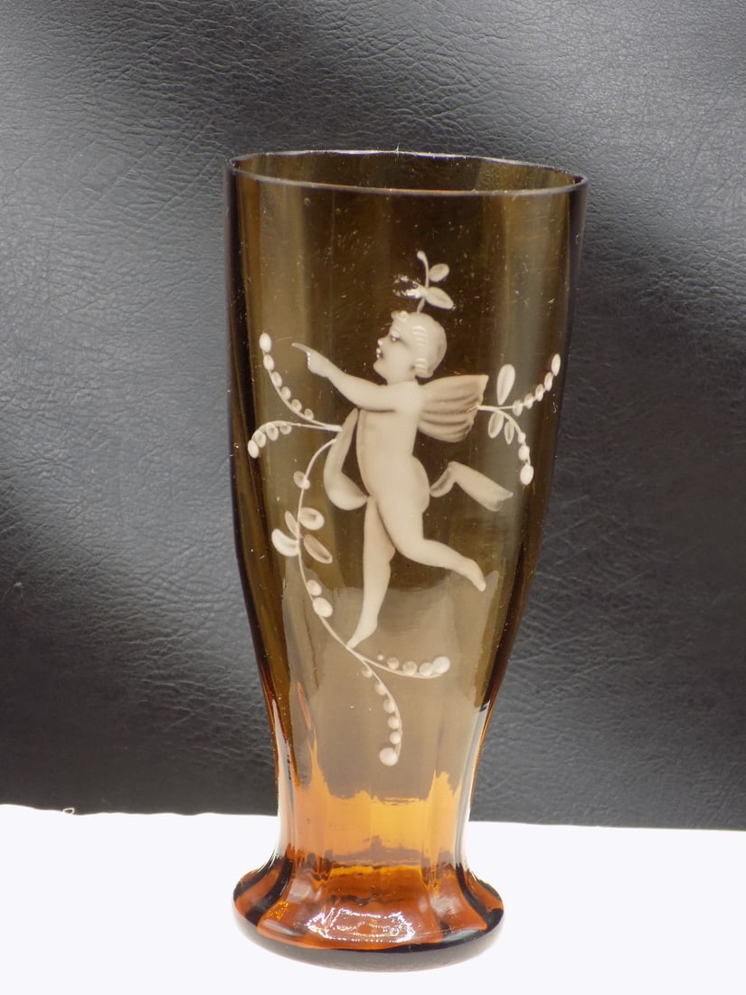 Vintage enamel decorated amber ribbed vase with cupid: Vintage enamel decorated amber ribbed vase with cupid. Beautiful colors. In very good original as found condition. Great quality and detail. 6 ¼ inches tall. White lines or dots are camera flas