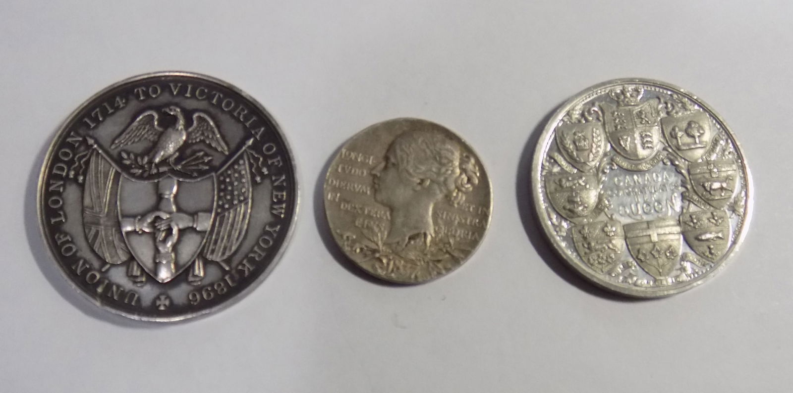 Three antique 1800’s Queen Victoria coins medals: Three antique 1800’s Queen Victoria coins medals. Victoria’s union fire insurance 1896. Queen Victoria Diamond Jubilee 1897. medal Queen Victoria Diamond Jubilee 1897 . In very good original as fo