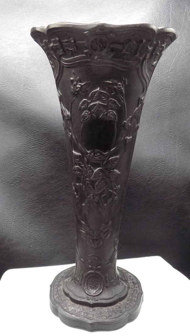 Antique Wedgewood black basalt vase: Antique Wedgewood black basalt vase. Marked on bottom as shown in photo. Floral decorated. Beautiful colors. In very good original as found condition. Great quality and detail. 9 5/8 inches tall. Matc