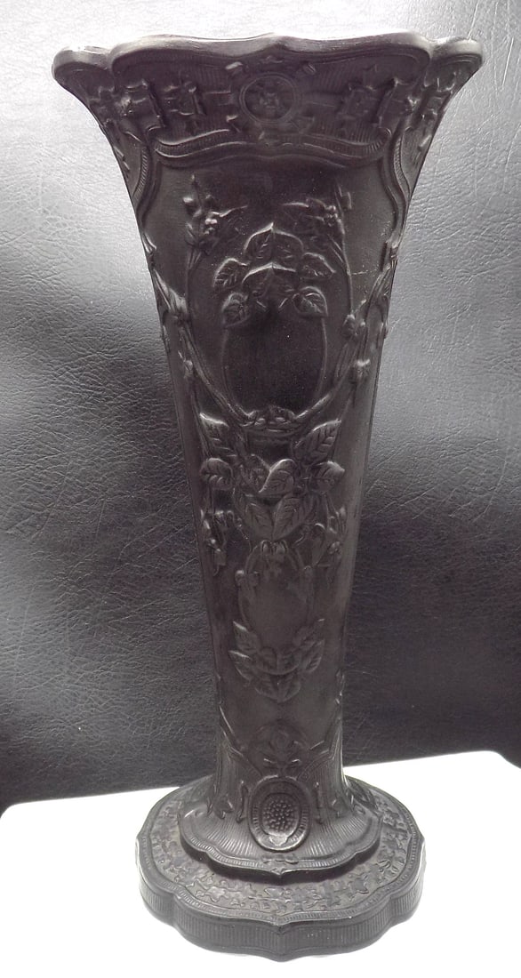 Antique Wedgewood black basalt vase: Antique Wedgewood black basalt vase. Marked on bottom as shown in photo. Floral decorated. Beautiful colors. In very good original as found condition. Great quality and detail. 9 5/8 inches tall. Matc