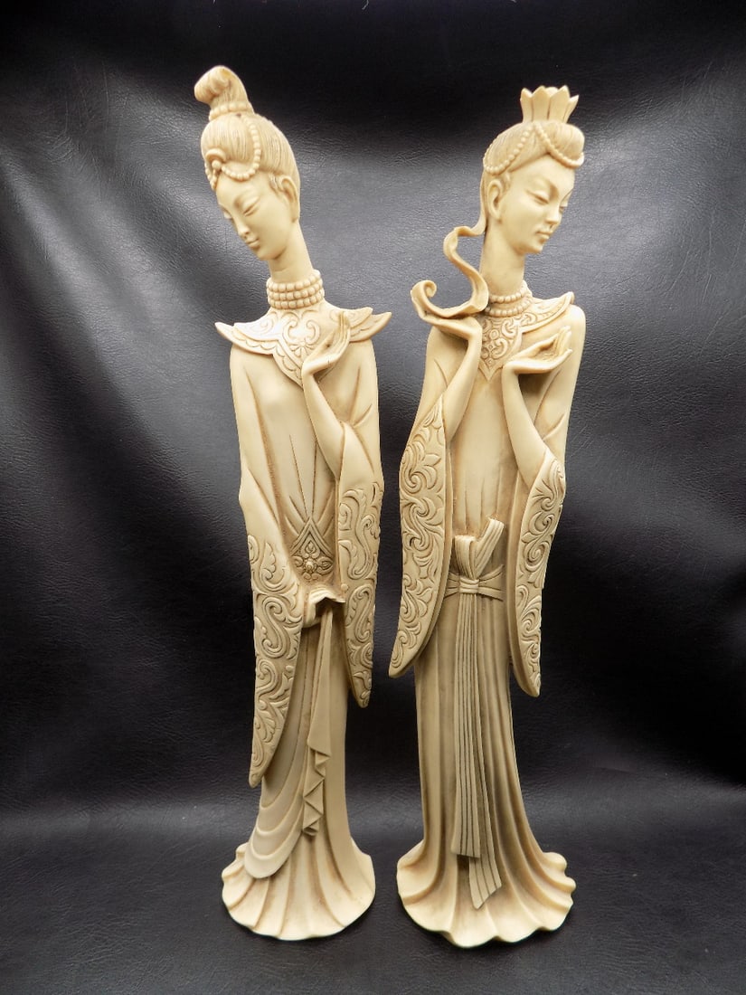 Elegant pair of Oriental female figures.: Elegant pair of Oriental female figures. Marked Made in Italy as shown in photo. Has an artist mark on one figure at bottom of skirt. Composition unknown. No shipping outside of United States. Beautif
