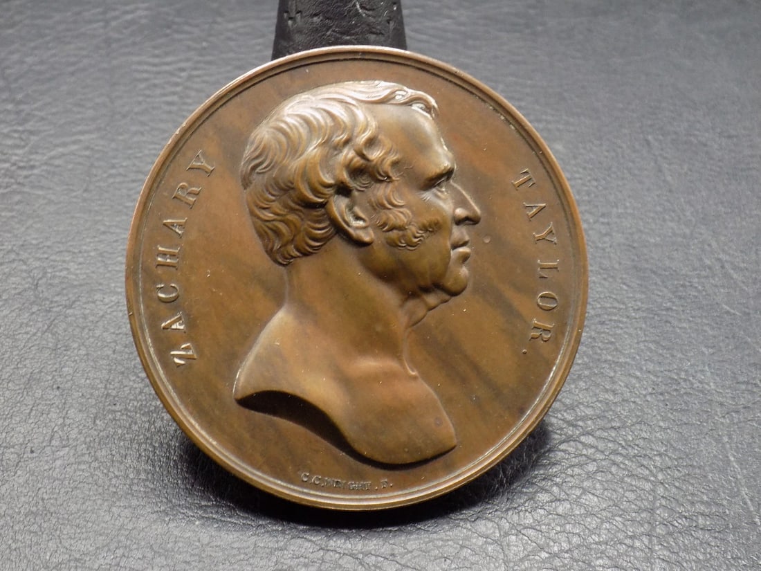 Rare 1800’s Bronze Zachary Taylor Presidential Medal: Rare 1800’s Bronze Zachary Taylor Presidential Medal . Near mint condition medal 2 ¼ inches. Box 3 ¾ inches. With original rose wood container ,worn as shown. Attributed to Pierre jean