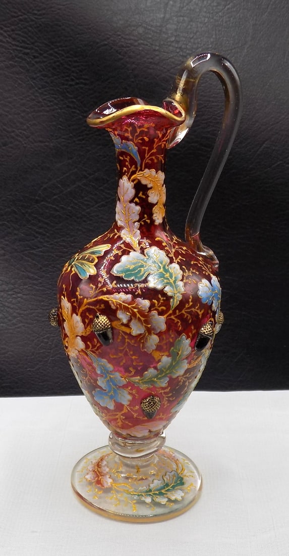 Outstanding antique Moser decorated miniature pitcher with acorns and oak leaves: Outstanding antique Moser decorated miniature pitcher with acorns and oak leaves. Elaborated raised enamel decoration with three dimensional acorns. Beautiful colors. In very good original as found co