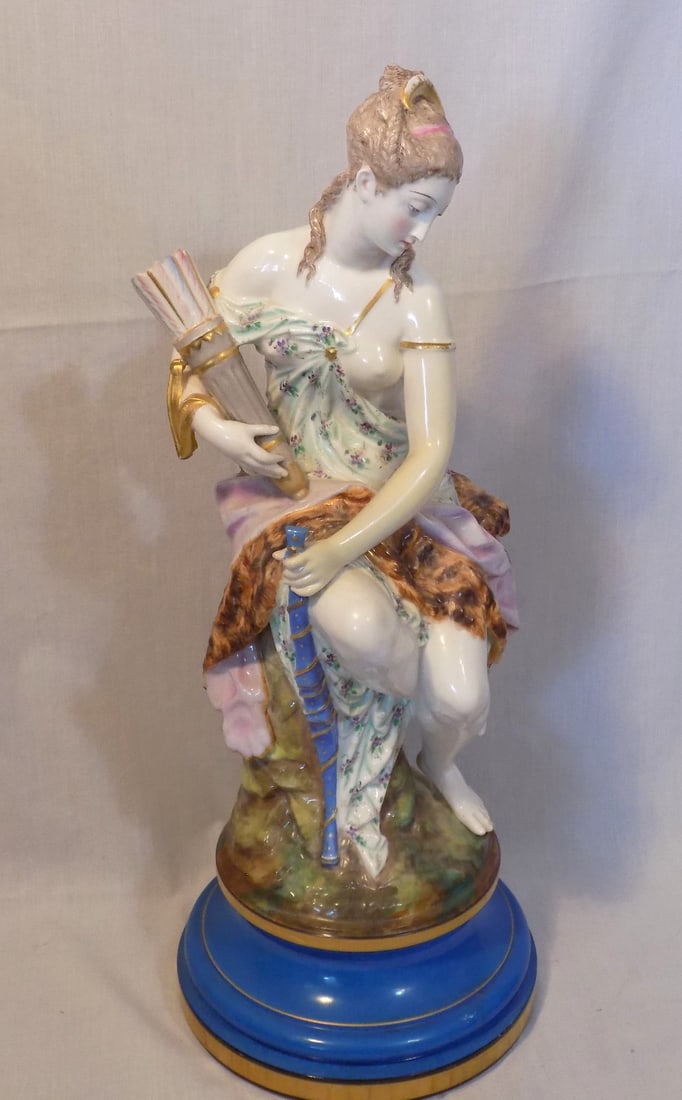 Antique Meissen or Nymphenburg porcelain seminude woman statue: Antique Meissen or Nymphenburg porcelain seminude woman statue. No marks. Lady holding wheat. Beautiful colors. In very good original as found condition. Great quality and detail. Approximately 12 lbs