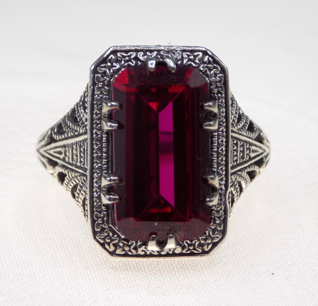 Beautiful 8 ct ruby sterling silver: Beautiful 8 ct ruby sterling silver ring. Lab created ruby. Size 7. For in house shipping, please call Mike at Thriftiques 319-321-0613