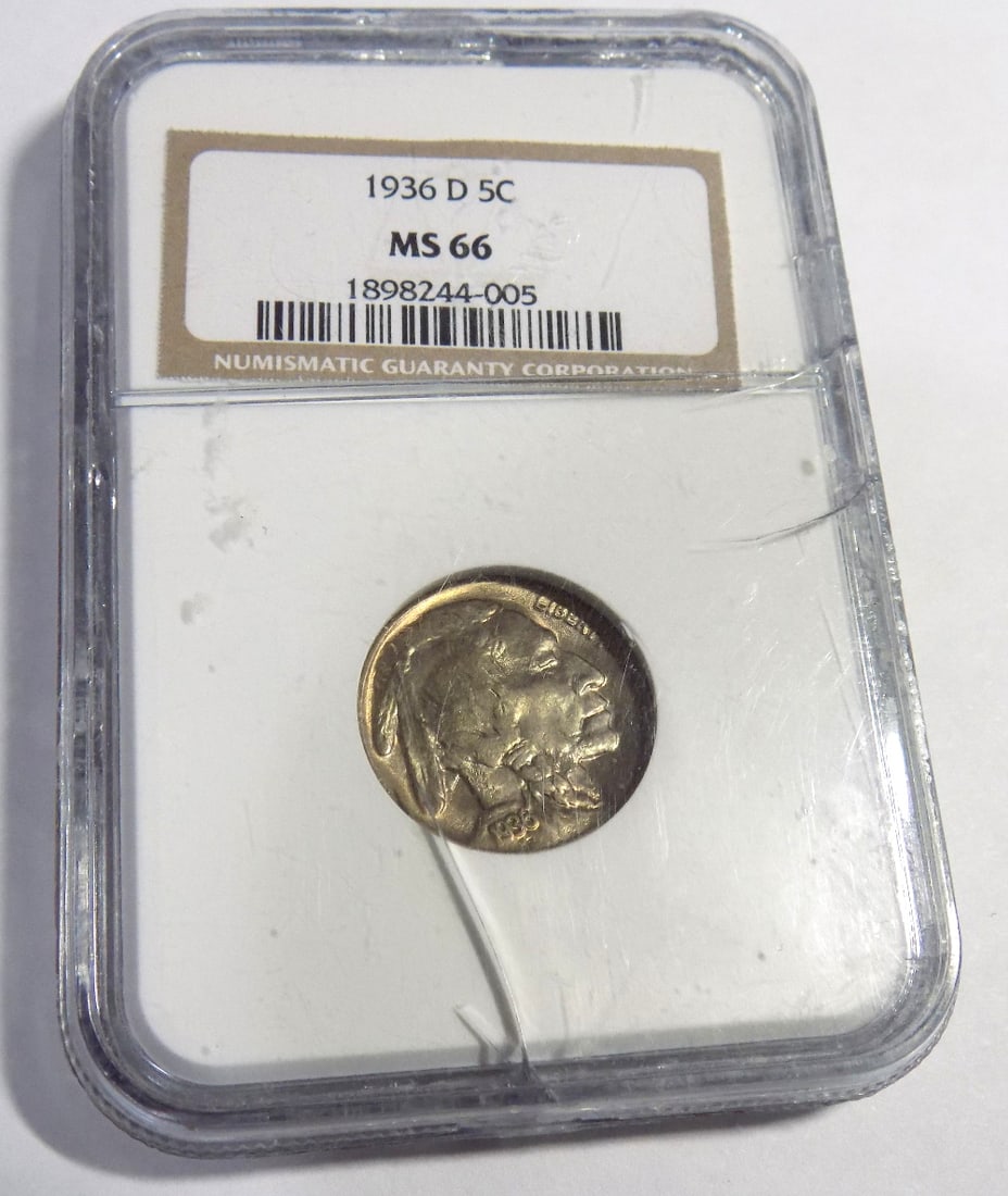 1936 D Uncirculated graded by NGC MS66 buffalo nickel: 1936 D Uncirculated graded by NGC MS66 buffalo nickel. Case has several cracks. Please see photos. For in house shipping. Please call Mike at Thriftiques 319-321-0613