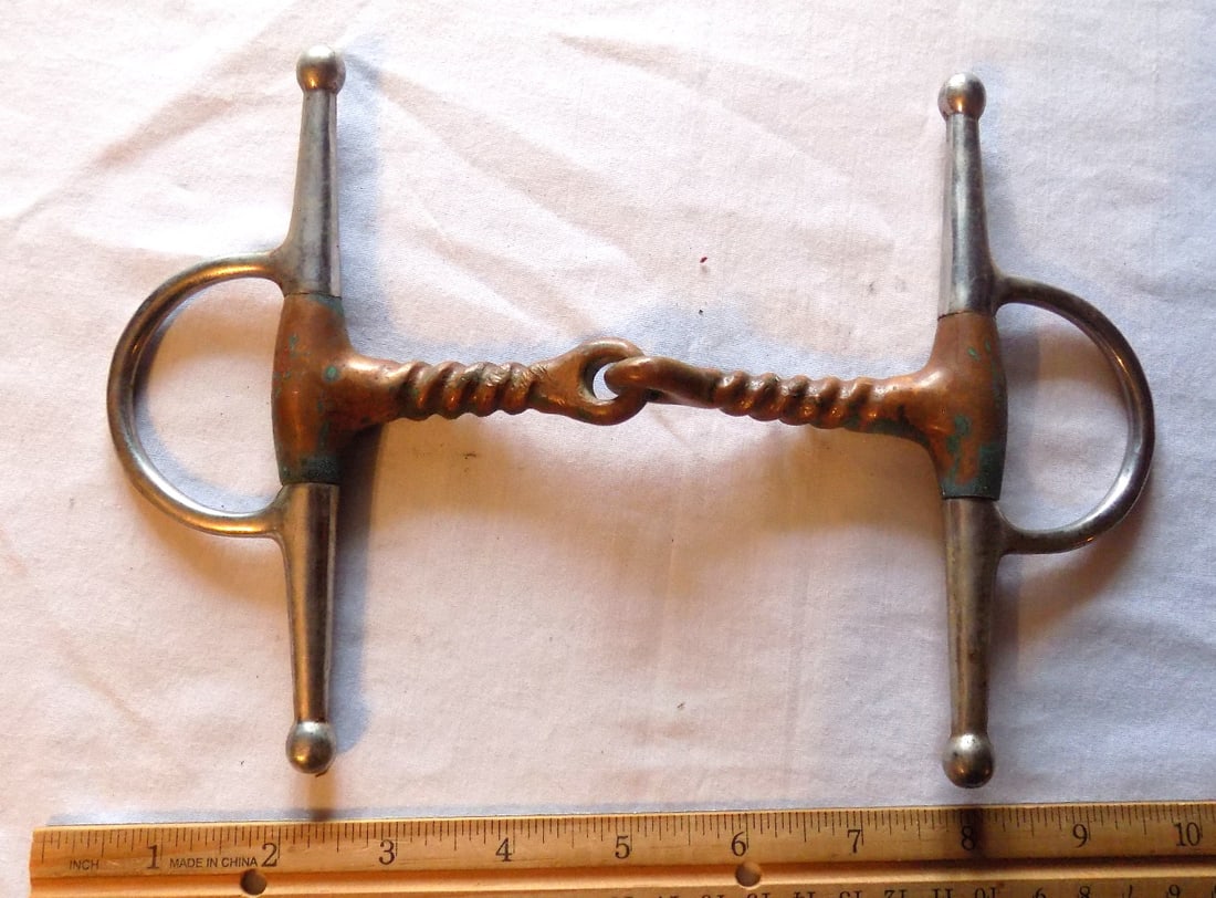 Antique horse bit. Silver and brass: Antique horse bit. Silver and brass. Please see photos with ruler for size. In very good original as found condition. Great quality and detail. For in house shipping, please call Mike at Thriftiques 3