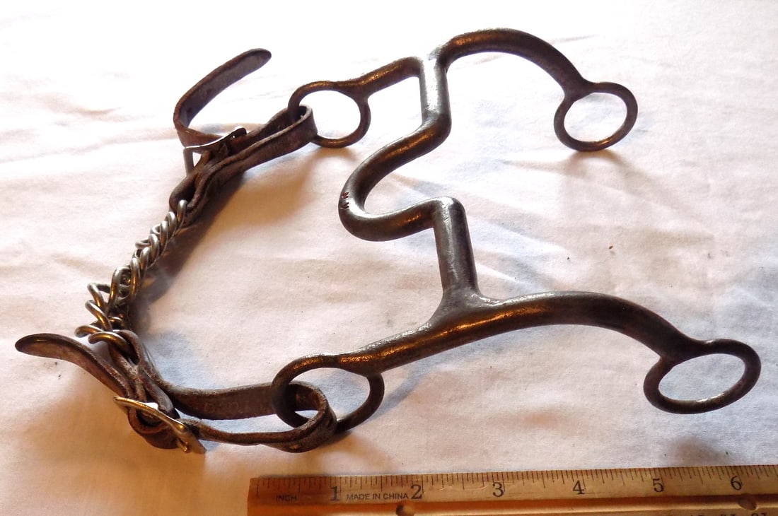 Antique K R signed horse bit: Antique K R signed horse bit. Please see photos with ruler for size. In very good original as found condition. Great quality and detail. For in house shipping, please call Mike at Thriftiques 319-321-