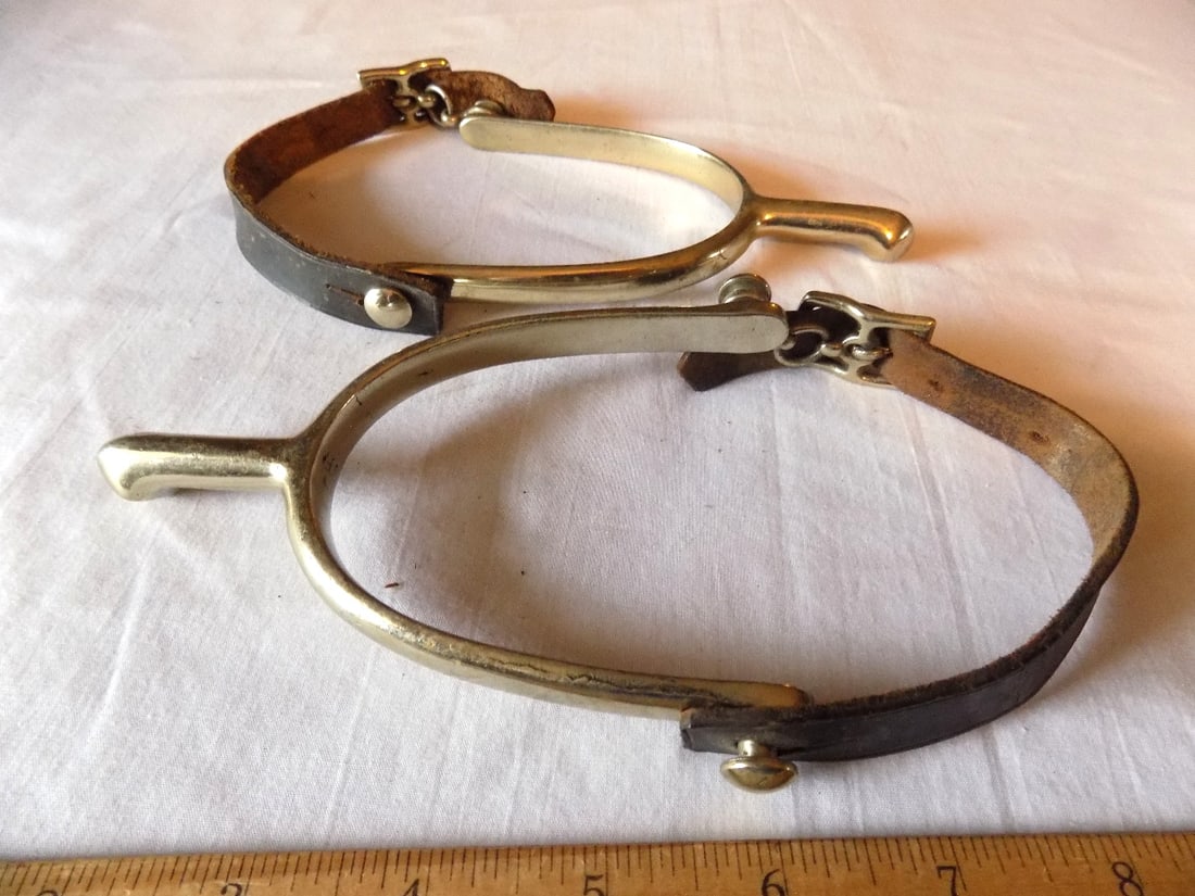 Antique signed A. B. spurs: Antique signed A. B. spurs. Probably August Buerman. Please see photos with ruler for size. In very good original as found condition. Great quality and detail. For in house shipping, please call Mike