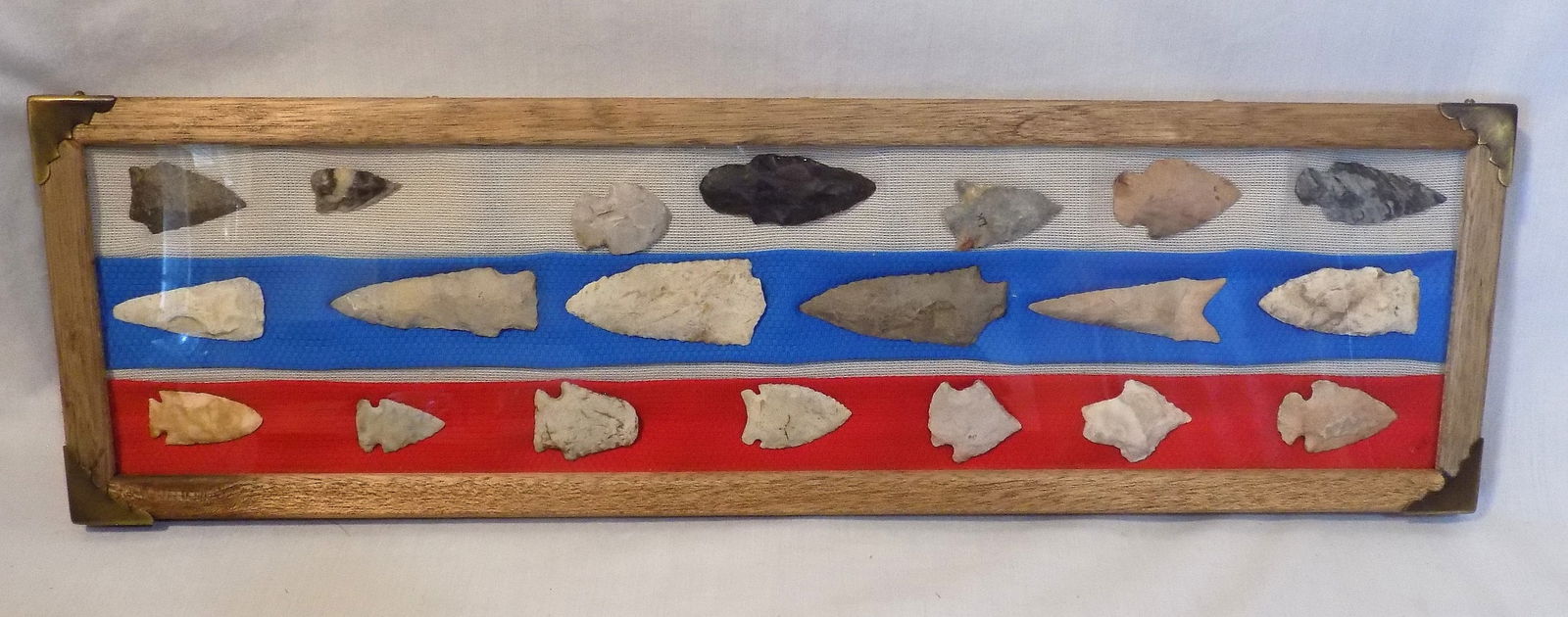 Antique collection of Native American Indian arrow heads: Antique collection of Native American Indian arrow heads. In sealed case. In very good original as found condition. Great quality and detail. Longest arrowhead 3 ¼ inches. Case 21 7/8 x 6 3/8 i