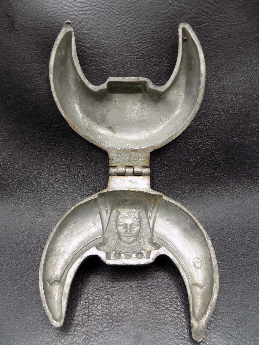 Antique Egyptian metal mold with Egyptian head: Antique Egyptian metal mold with Egyptian head. In very good original as found condition. Great quality and detail. Closed 4 ¼ wide x 4 ½ tall. For in house shipping, please call Mike at