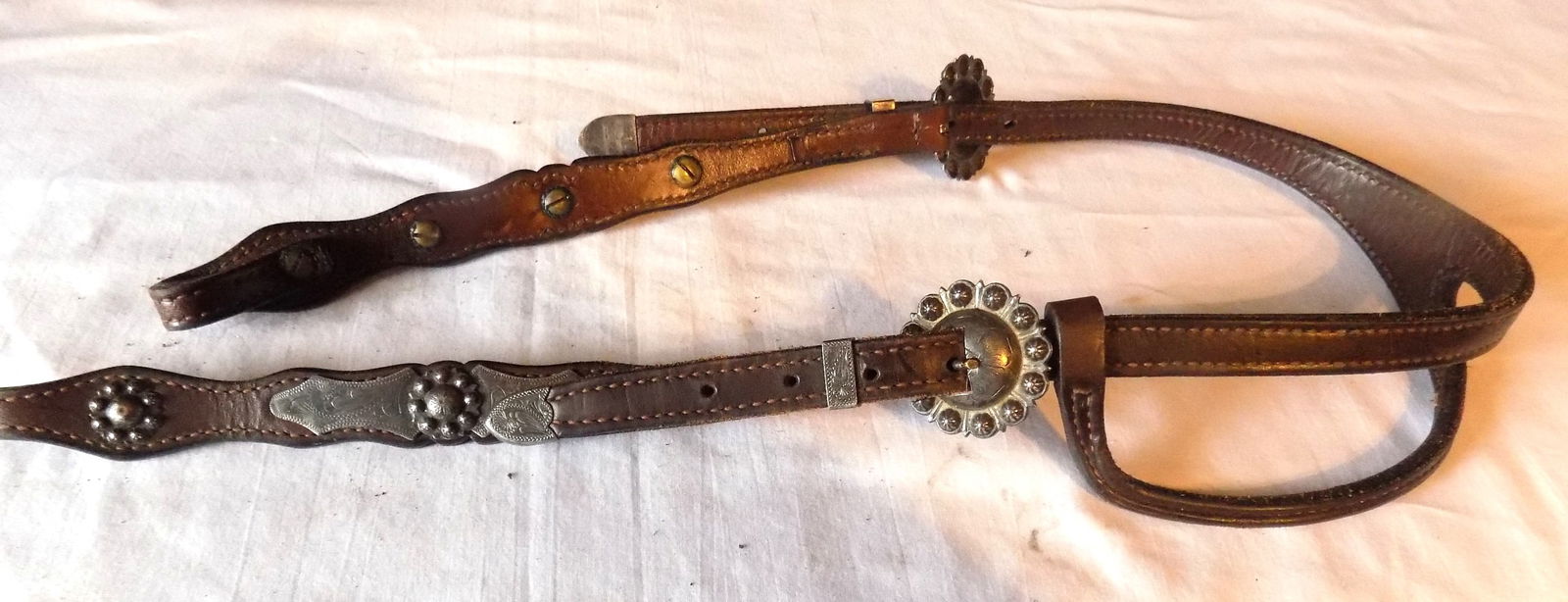 Elaborate vintage engraved silver mounted with conchos headstall or bridle: Elaborate vintage engraved silver mounted with conchos headstall or bridle. Please see photos with ruler for size. In very good original as found condition. Great quality and detail. For in house ship