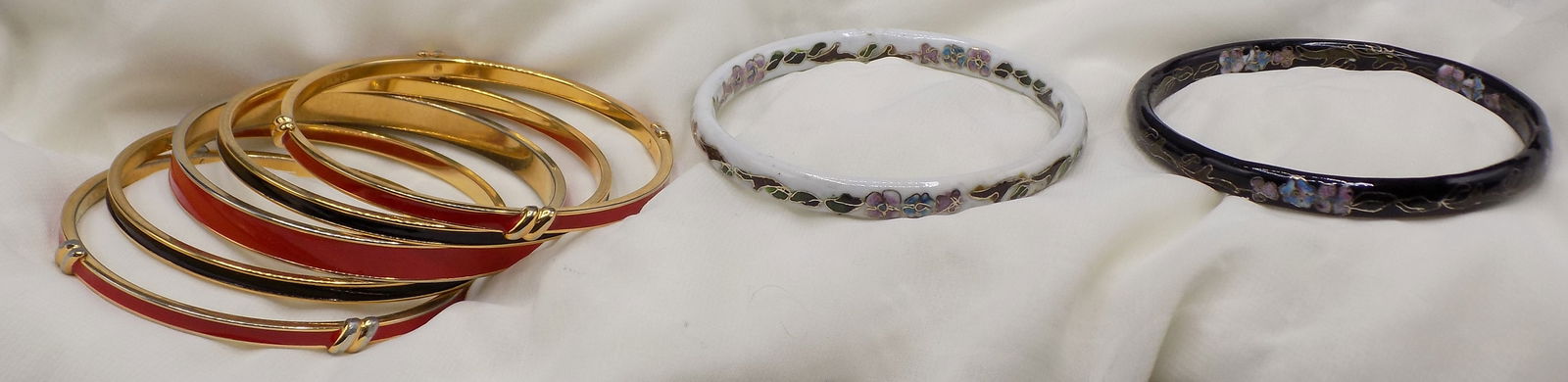 Collection of vintage Monet bracelets or bangles and two others: Collection of vintage Monet bracelets or bangles and two others. Marked as shown in photo. Beautiful colors. In very good original as found condition. Great quality and detail. 2 ½ wide. For in