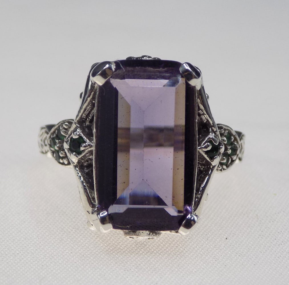 Beautiful 7 ct amethyst sterling silver ring: Beautiful 7 ct amethyst sterling silver ring. Size 6. For in house shipping, please call Mike at Thriftiques 319-321-0613.