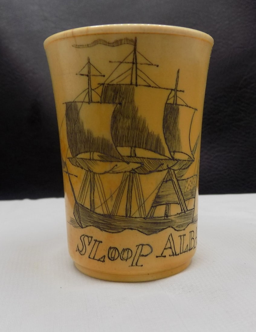 Scrimshaw sailing ship steer horn shot glass: Scrimshaw sailing ship steer horn shot glass. In very good original as found condition. Great quality and detail. 2 ½ tall. For in house shipping, please call Mike at Thriftiques 319-321-0613