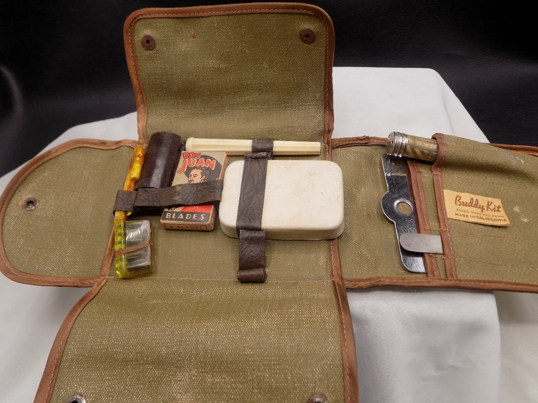WWII military issued shaving kit: WWII military issued shaving kit. Please see photos for condition. Great quality and detail. 5 x 3 ½ inches closed. For in house shipping, please call Mike at Thriftiques 319-321-0613