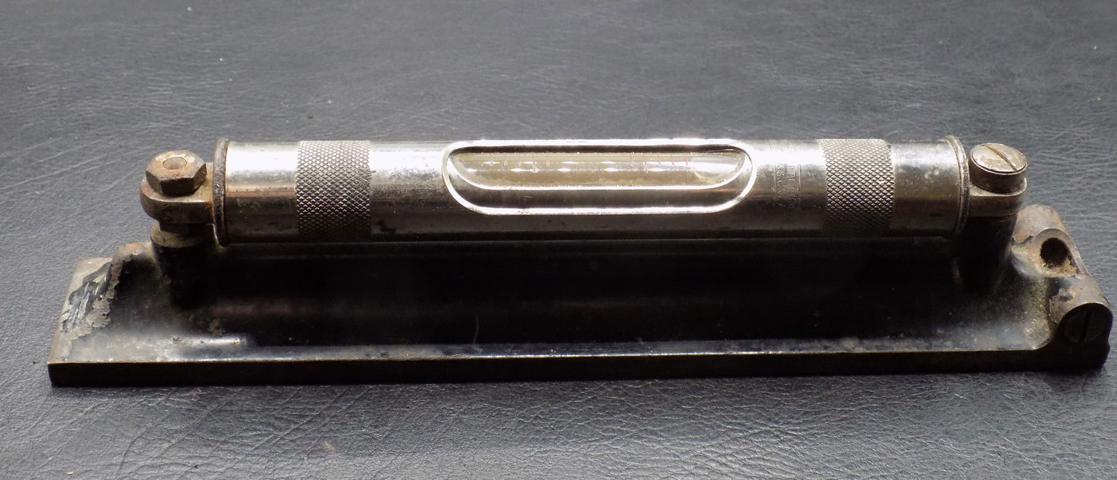 Antique pipe or tubing level: Antique pipe or tubing level. Cast iron base. Marked The L. S. Starrett Co. Massachusetts. In very good original as found condition. Great quality and detail. For in house shipping, please call Mike a