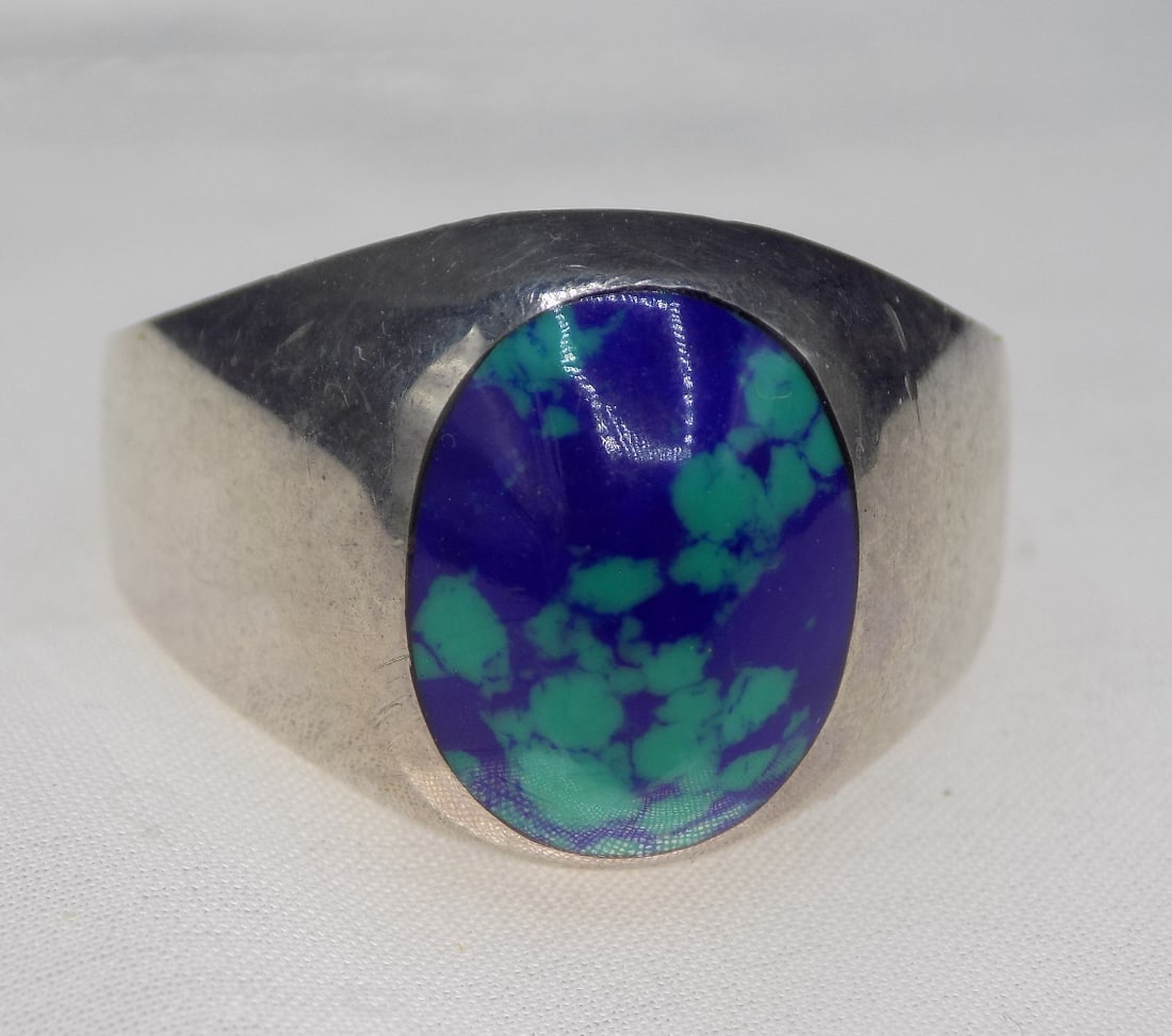 Sterling ring with Australian opal gemstone: Sterling ring with Australian opal gemstone. Marked on back Mexico with artist initial as shown in photo. Size 13. For in house shipping, please call Mike at Thriftiques 319-321-0613