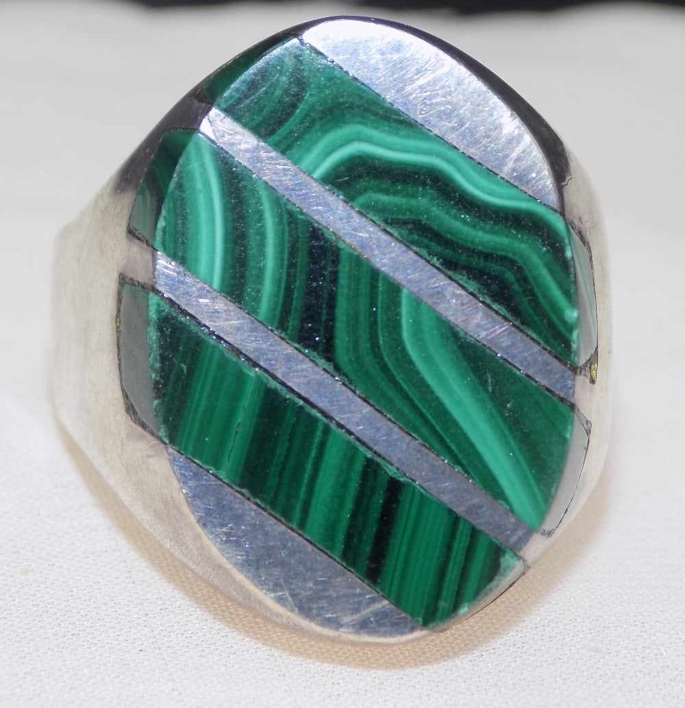 Vintage sterling ring with malachite gemstone: Vintage sterling ring with malachite gemstone. Marked on back Mexico with artist initial as shown in photo. Size 13. For in house shipping, please call Mike at Thriftiques 319-321-0613