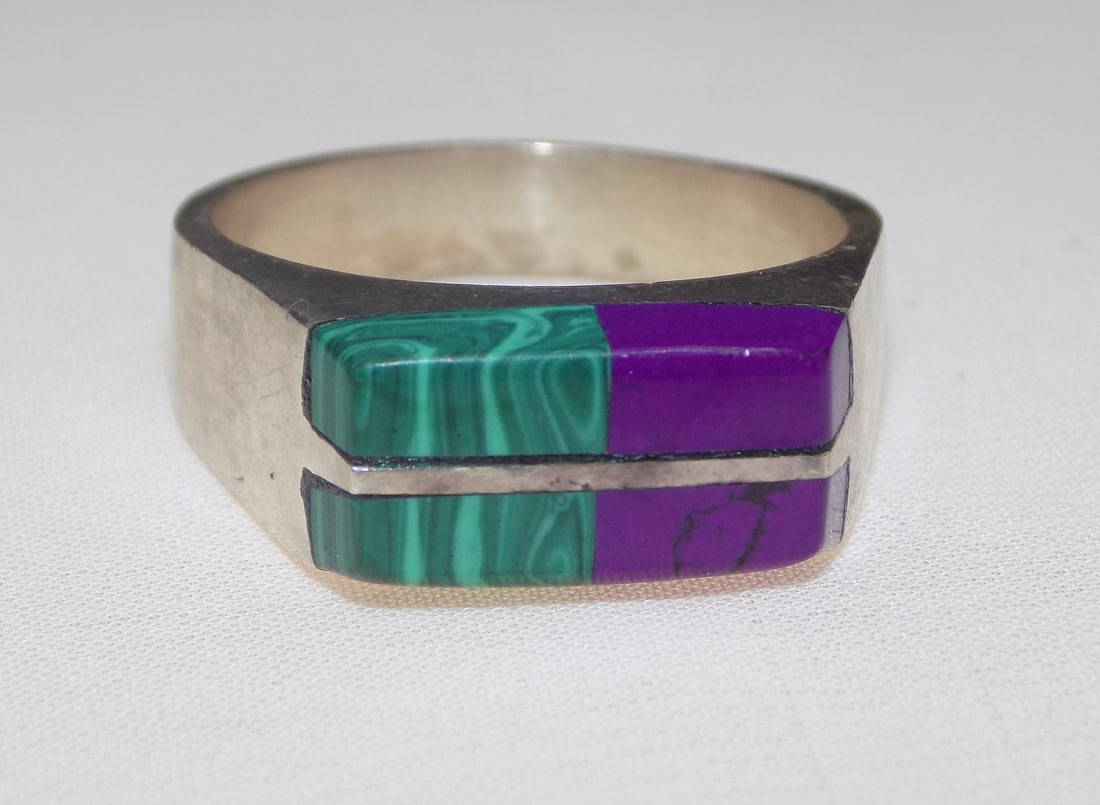 Vintage sterling ring with malachite and shgilite gemstone: Vintage sterling ring with malachite and shgilite gemstone. Marked on back Mexico with artist initial as shown in photo. Size 11 ½. For in house shipping, please call Mike at Thriftiques 319-32