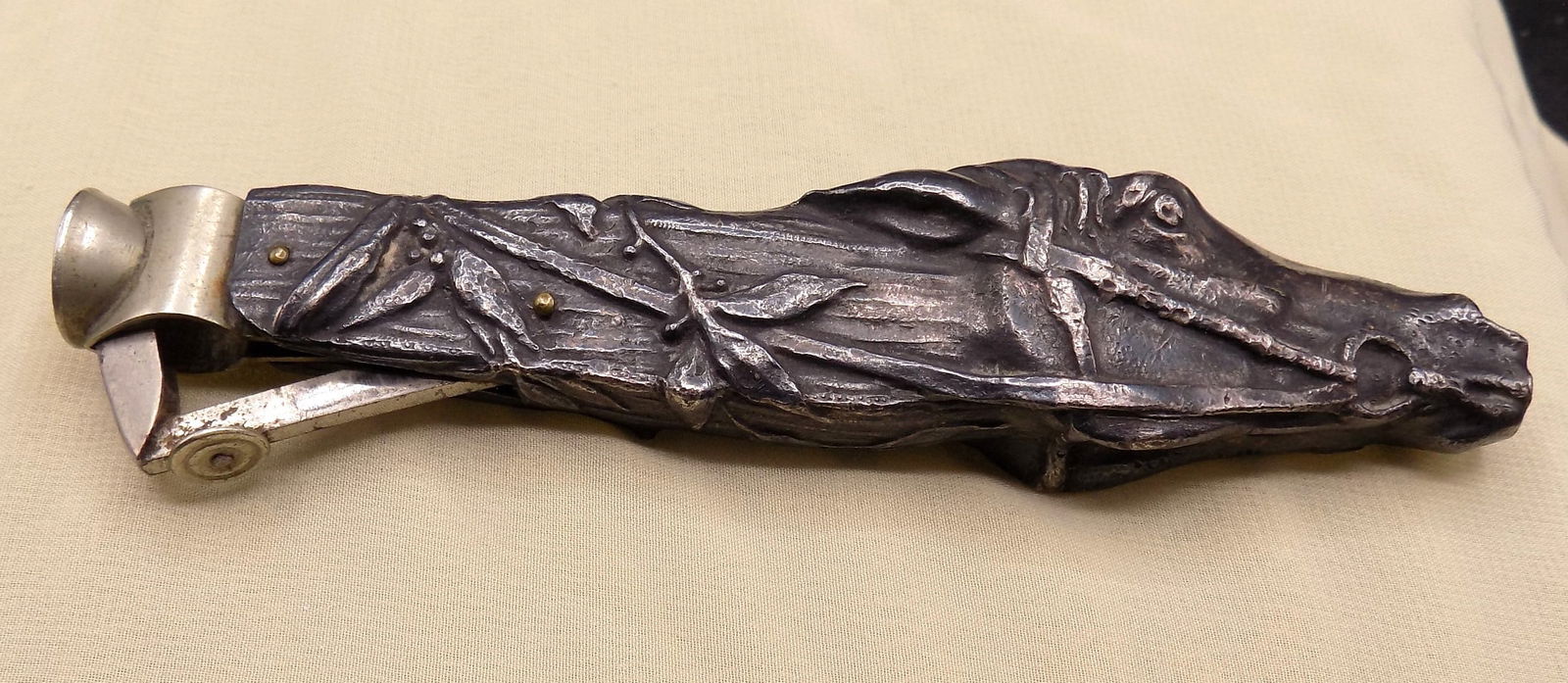 Fabulous antique cigar cutter with figural horses. (1 of 2)