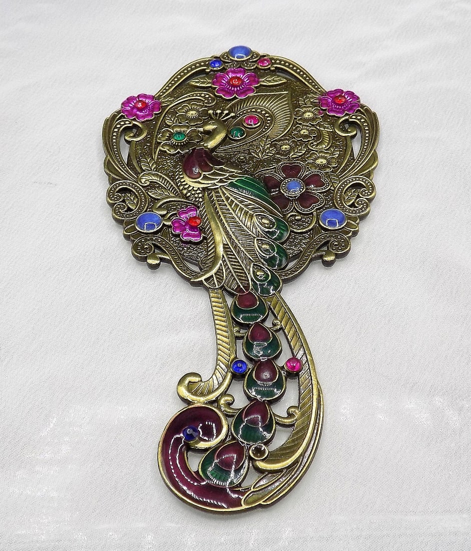Fancy jeweled hand mirror with peacock and flowers: Fancy jeweled hand mirror with peacock and flowers. Beautiful colors. In very good original as found condition. Great quality and detail. 5 ½ inches tall x 2 ¾ wide. For in house shipping, p