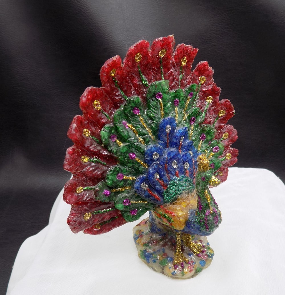 Vibrant colored peacock. Appears to be made of acrylic (1 of 5)