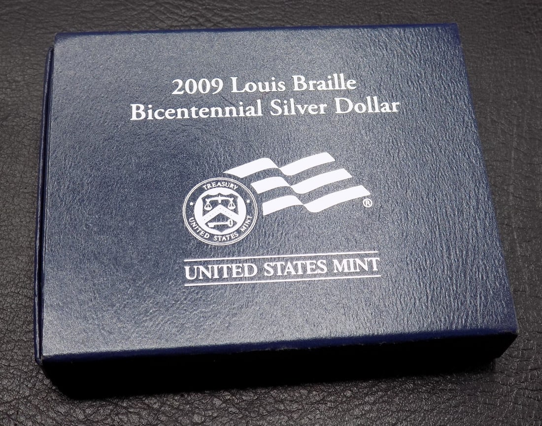 Uncirculated 2009 louis Braille bicentennial silver dollar: Uncirculated 2009 louis Braille bicentennial silver dollar. In very good original as found condition. Great quality and detail. For in house shipping, please call Mike at Thriftiques 319-321-0613